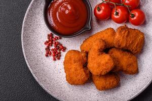 Delicious fresh crispy chicken nuggets, unhealthy food, fast food photo