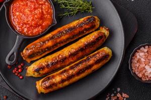 Chicken or pork sausages with salt, spices and herbs photo