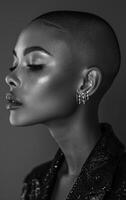 Model's elegant side profile A striking side profile of a model with a shaved head, displaying unique facial features and shimmering jewelry in soft light. photo