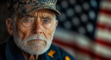 A man with a military hat and beard is looking at the camera. The image has a patriotic mood photo