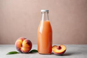 front view juice glass bottle with peach photo