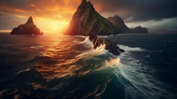 A beautiful sunset over the ocean with rocks and mountains photo