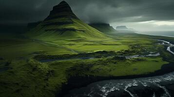 A green landscape with mountains and water photo