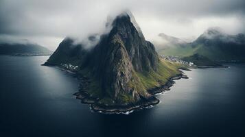 A mountain range in the middle of the ocean photo