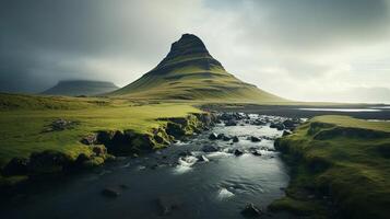A mountain with a stream running through it photo