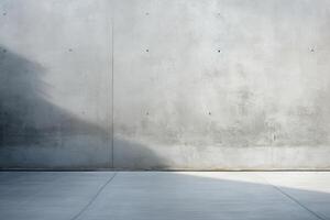 An empty concrete wall with a light shining on it photo