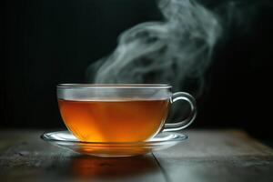 Steam Rising from a Cup of Tea on a Striking Black Background for a Cozy Vibe photo