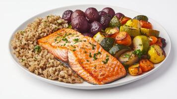 Delicious Grilled Salmon Dinner with Roasted Vegetables and Brown Rice on a White Plate photo