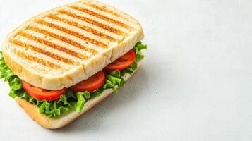 Fresh Grilled Sandwich with Lettuce and Tomato on White Background - Perfect for Lunch Breaks photo