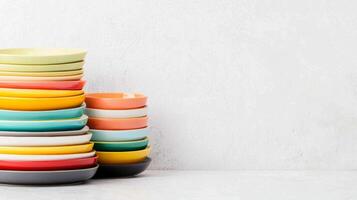 Colorful Stack of Dinner Plates Against a White Background for Modern Dining Concept photo