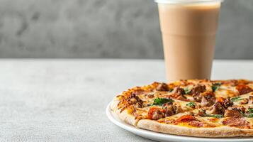 Delicious Pizza and Iced Coffee on a Concrete Table During a Relaxing Lunch Break photo