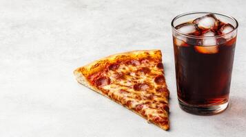 Delicious Pepperoni Pizza Slice and Refreshing Iced Cola on a White Background - Perfect Lunch Break Meal photo