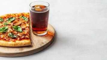 Delicious Pepperoni Pizza Slice with Fresh Basil and a Refreshing Drink on a Wooden Board During Lunch Break photo
