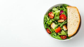 Fresh and Healthy Lunch Break with Salad and Sandwich on White Background photo