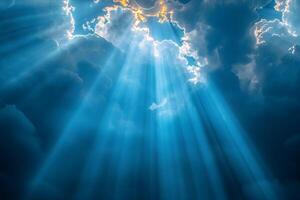 Celestial Sunbeams Filtering Through Majestic Clouds in a Serene Sky photo