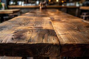 Rustic Wooden Table Surface in Cozy Cafe Setting Ideal for Backgrounds and Design Projects photo