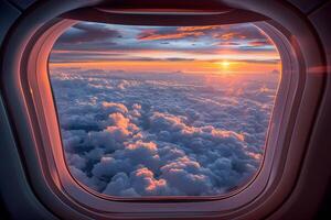 Stunning Aerial View of Sunset over Clouds from Airplane Window for Travel Inspiration photo