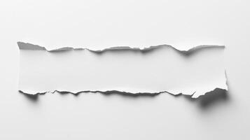 clean horizontal tear across a sheet of white paper reveals a minimalist backdrop ideal for text addition. Subtle shadows enhance the artistic allure of this simple design. photo
