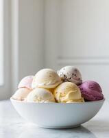 A bowl of ice cream with different flavors in it photo