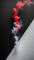 A red and white smoke trail on a black and white background photo