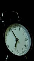Vertical time lapse of a clock time passing over a day to night. video