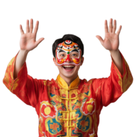 Boy dressed in a colorful costume with a dragon mask, raising both hands in celebration, on a transparent background. png