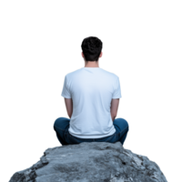 Man sitting on a large rock, back turned, wearing a white t shirt, on a transparent background. png