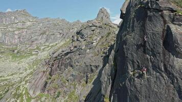 Scaling New Heights. A Thrilling Journey of a Fearless Adventurer Conquering the Majestic Mountain video