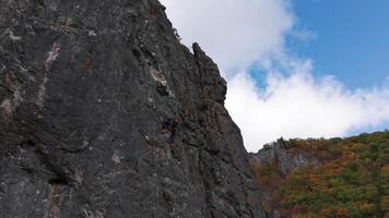 Man Climbing Up Side of Mountain video