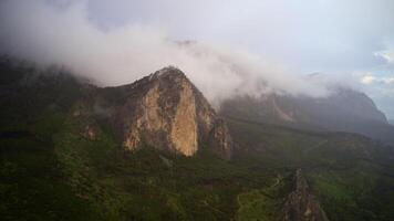 Majestic Peaks Hidden in Mysterious Mist and Brooding Clouds video