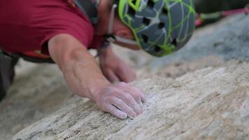 Scaling New Heights. A Fearless Climber Conquers a Majestic Rock Face with Skill and Determination video