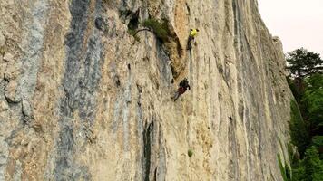 The Thrilling Ascent. A Man Conquering the Vertical Challenge with Courage and Determination video