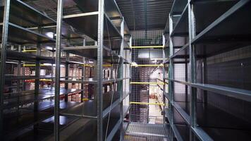 View inside of the inside of a large industrial facility. Creative. Stairs and shelves in a storage room. video