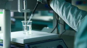 Laboratory studies with medicines. Stock footage. Test tubes with chemical elements with the observation of scientists and various reactions. video