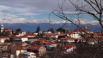 Tourist places in Europe. Action. A large river surrounded by mountains and small residential houses of tourists and locals built around the hills. video
