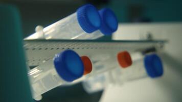 Expertise. Stock footage. Test tubes with analyses rotating around on a special device. video