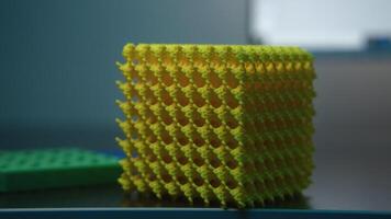 Close-up of abstract cubes from constructor. Stock footage. Abstract toy constructor with geometric shapes. Constructor with cubes and abstract details video