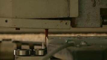 Working new technologies. Creative. Sawing and inserting nails into wood machine that works quickly. video