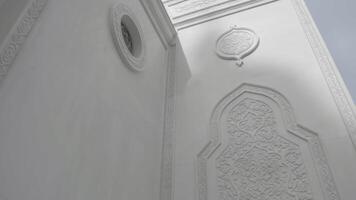 Details of entrance to the temple with carved ornament of arcuate shape. Scene. Concept of architecture. video