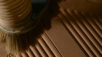 Clearing wood from sawdust. Creative. A new sawn pattern that is cleaned with brushes and removes fine dust from the tree. video
