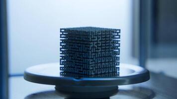 Close-up of cube in laboratory. Stock footage. Futuristic 3D cube lies in scientific laboratory. Unidentified mysterious cube is in scientific laboratory video