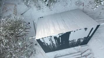 Top view of construction site of house in forest in winter. Clip. House under construction in dense coniferous forest in winter. Construction of single house in wilderness in winter video