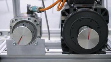 Metal cylindrical parts with rotating disks with indicators. Media. Industrial background at the workshop. video