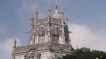 Beautiful medieval architecture of palace in Gothic style. Action. Beautiful Gothic architecture of white castle on sunny summer day. Architecture of Gothic white castle in Portugal video