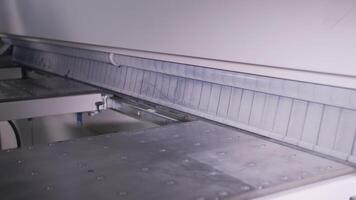 Opening flap at the factory workshop. Creative. Industrial background with working mechanism. video