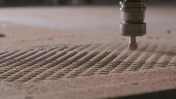 Engraving machine carving wood board. Creative. Automatic machine cutting wooden surface and creating a pattern. video