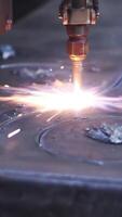 Close-up of metal pattern welding machine. Clip. Automated welding machine creates beautiful patterns on metal in factory. Factory welding patterns on metal video