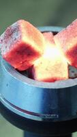 Close up of hookah red hot coals, process of hookah preparation. Media. Blowing on hot hookah coals with flying sparcles on blurred background. video