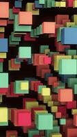 Abstract flowing blue, green, red, and yellow cubes isolated on black background. Animation. Rotating vertical rows of colorful 3D cubes, seamless loop. video