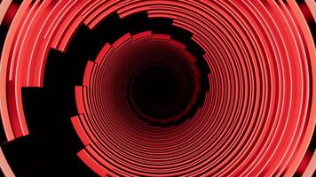 Red and orange neon patterns. Design. Black background with thin narrow stripes that make circular motion in 3d format. video